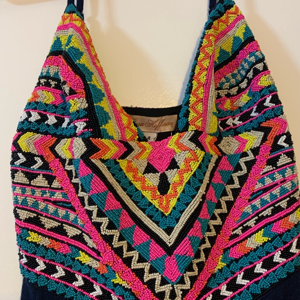 Beautiful dress with multi colored beading and long bottom